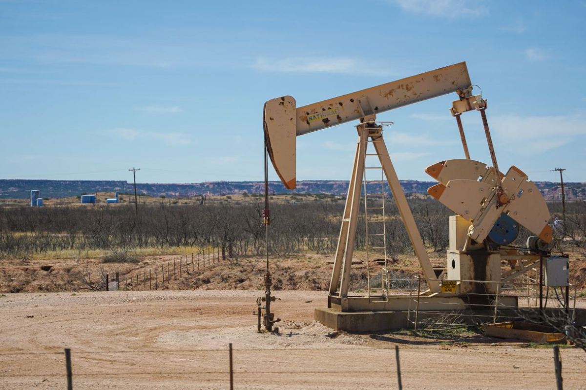 Pumpjack on a well in arid land